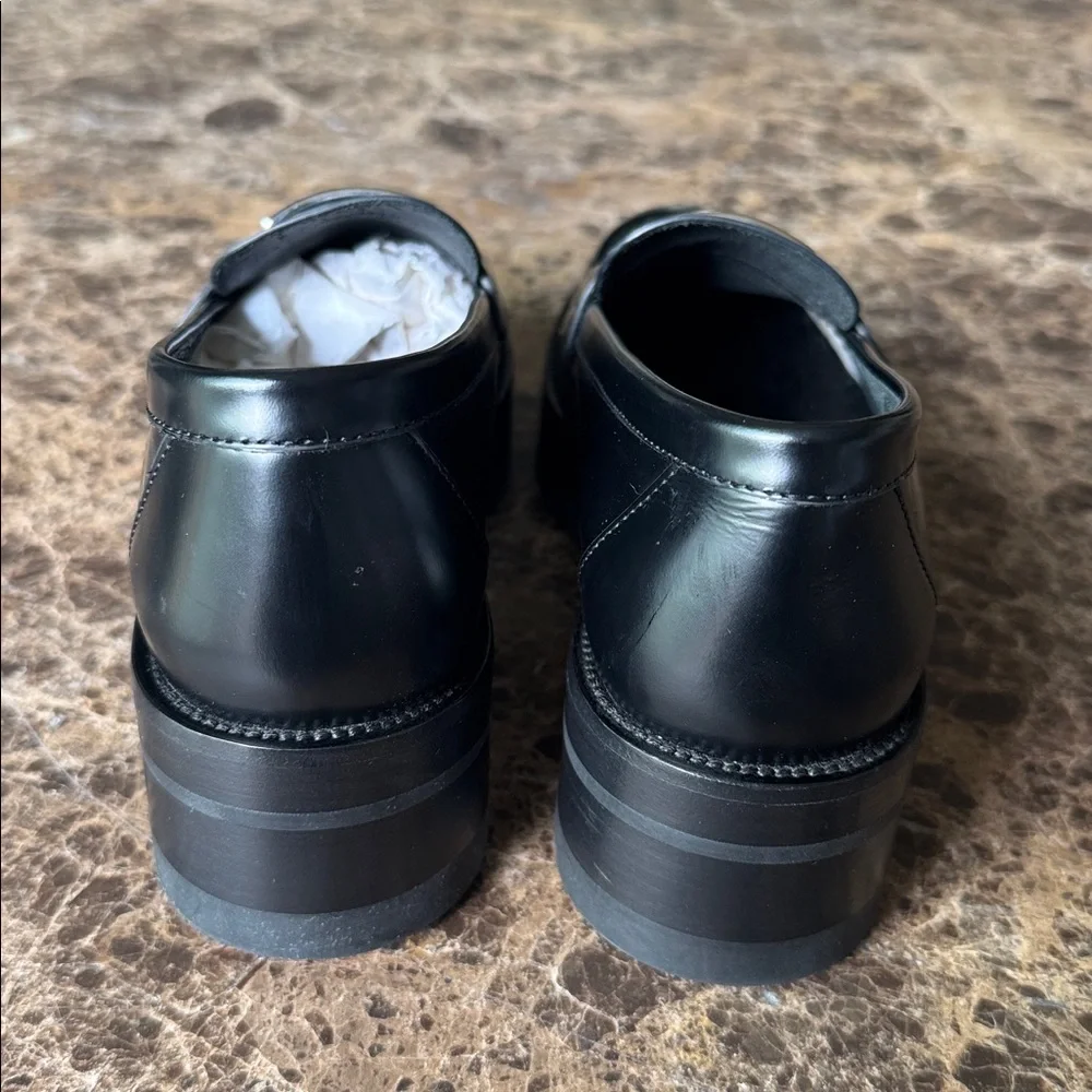 Chanel black shiny calf loafers moccasins chunky flats silver logo sz 37.5